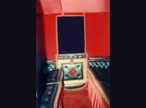 Interno carrozza, con vista moquette, passamaneria, velluto e pelle. Anno 1990.